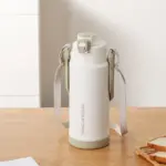 Creative insulation pot large capacity stainless steel vacuum hot water heater with handle portable kettle 2300mL/77oz - Image 4